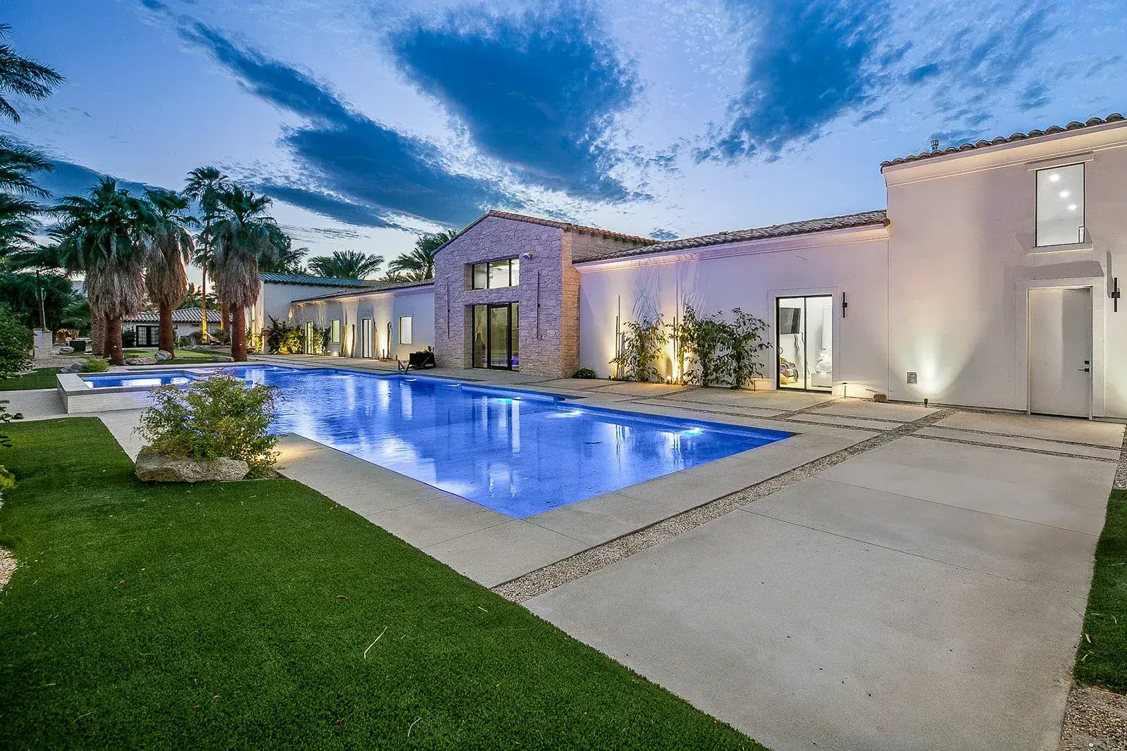 The estate pool and main house terrace at Cache Estate