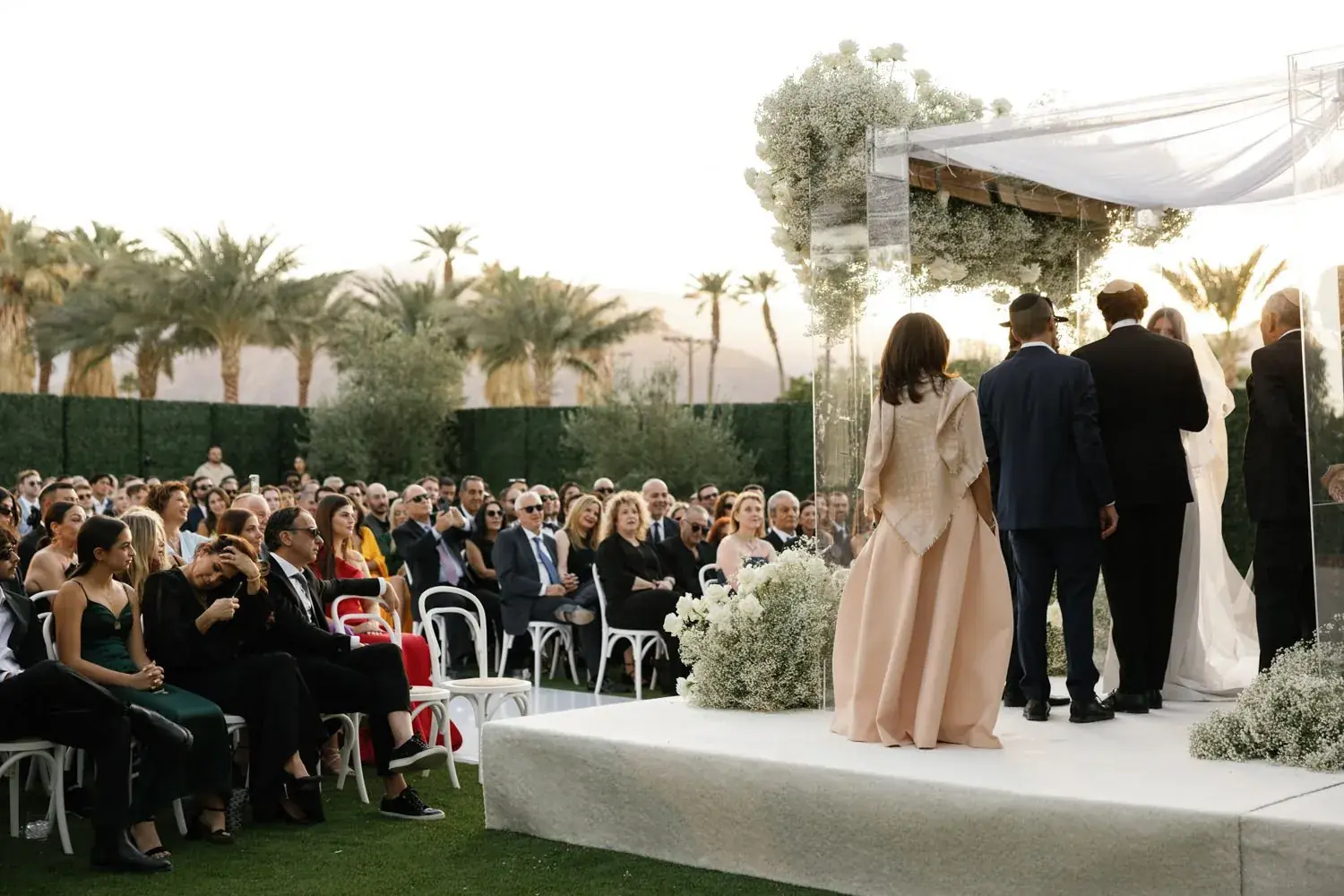 Wide shot of a wedding ceremony on the lawn